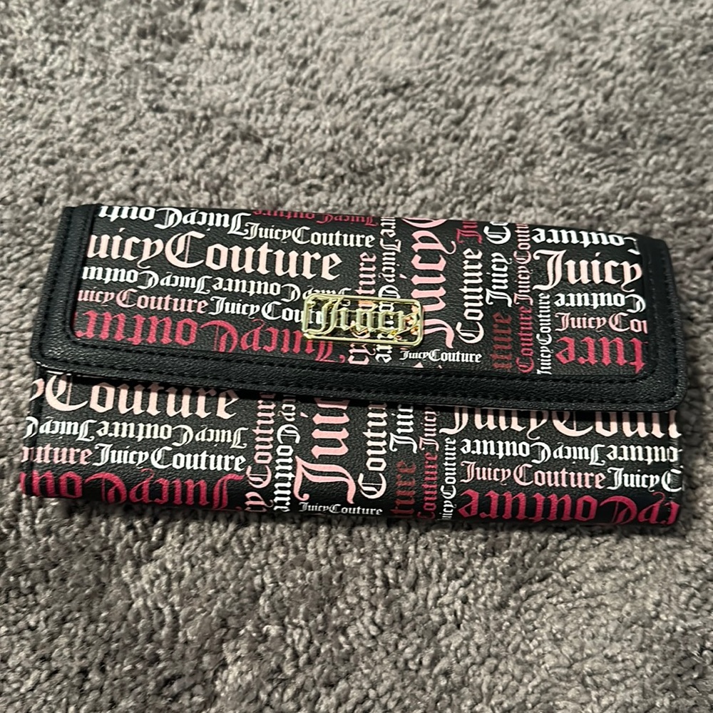 Brand new juicy couture wallet, black with multi color writing.